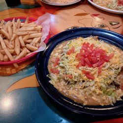 El Taco Loco II - Indian taco stuffed with shredded beef (YUM) and a side of fries.