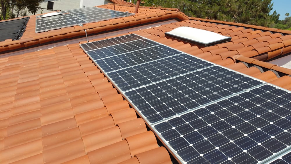 Slide of Kenney Roofing