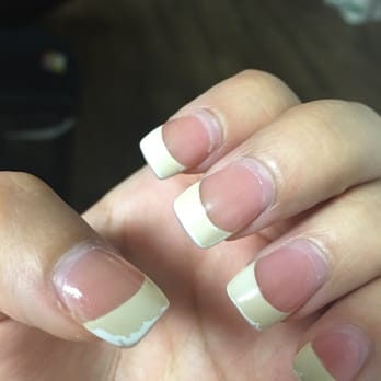 QC Nails - You could see the film coming off that is making the nails look yellow. They painted the white on so I can't clean them off with remover - Nail Salons Near Me - Stockbridge, Georgia QC Nails - You could see the film coming off that is making the nails look yellow. They painted the white on so I can't clean them off with remover - Nail Salons Near Me - Stockbridge, Georgia