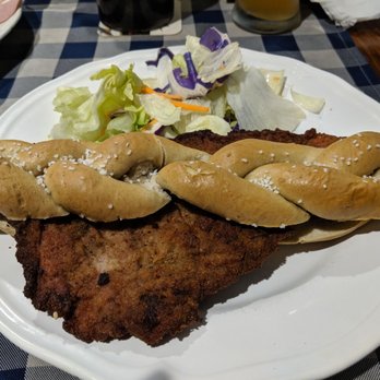 The Bavarian Haus - Pork schnitzel on a pretzel baguette - German Near Me - Mount Dora, Florida The Bavarian Haus - Pork schnitzel on a pretzel baguette - German Near Me - Mount Dora, Florida