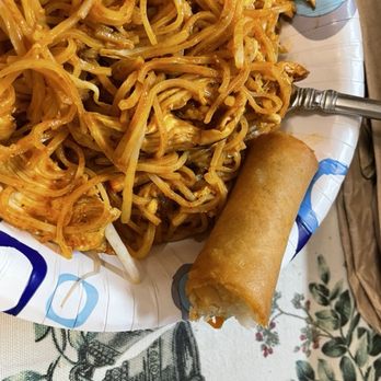 Eattini Thai Kitchen - One of the crispy well-flavored fresh spring-rolls, and you see some of the large tender chicken pieces in the pad Thai - Thai Near Me - Ellicott City, Maryland