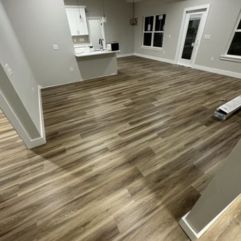 Sunset Emerald Flooring - an empty living room - Flooring Near Me Sunset Emerald Flooring - an empty living room - Flooring Near Me