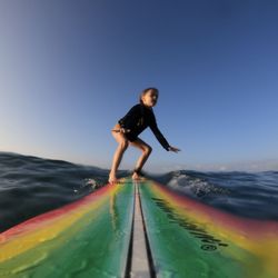 Swell Maui Surf Lessons - She was having a blast on the board before getting up close and personal with a sea urchin.