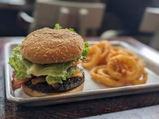 Photo of Jenny’s Burgers - San Francisco, CA, US. Avocado Bacon Cheeseburger with Onion Rings