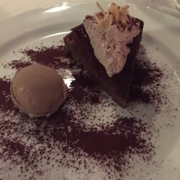 Yummy chocolate soufflé tart, although it tastes more like a chocolate cake than a tart Yummy chocolate soufflé tart, although it tastes more like a chocolate cake than a tart
