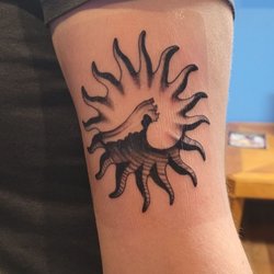 Incredible Ink Tattoo - This is a matching tattoo I got with my best friend of 8 years also compliments of Rob.