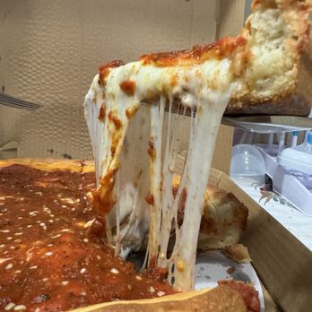 Chi Town Pizza - The cheese pull was awesome. - Pizza Near Me Chi Town Pizza - The cheese pull was awesome. - Pizza Near Me