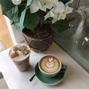 Coffee Code Espresso Bar - Iced Almond Milk Chai Latte w/ coffee ice cubes and Hot Vanilla Latte - Coffee & Tea Near Me - Fullerton, California Coffee Code Espresso Bar - Iced Almond Milk Chai Latte w/ coffee ice cubes and Hot Vanilla Latte - Coffee & Tea Near Me - Fullerton, California