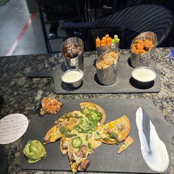Topgolf - Steak nachos & boneless wings 3 flavors. Asian sesame, buffalo & garlic parmesan. - New American Near Me - Edison, New Jersey