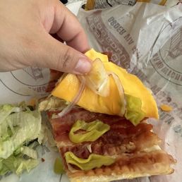 Tiny pepperchini w/an up charge. I moved the lettuce to the side to show the whole 2 slivers of onion -also an up charge .