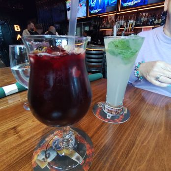 Tiny Tapas And Bites - Cheers with sangria and a mojito - Tapas/Small Plates Near Me - New York, New York