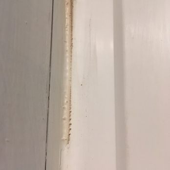 XPro Remodeling - Exposed shims on window installation - Flooring Near Me