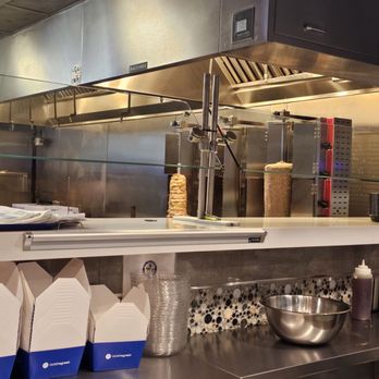 Nick The Greek - a view of a restaurant kitchen - Greek Near Me - Irving, Texas Nick The Greek - a view of a restaurant kitchen - Greek Near Me - Irving, Texas