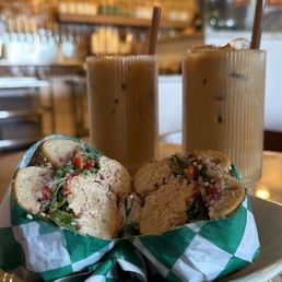 Tuna on sesame bagel and two almond milk iced lattes