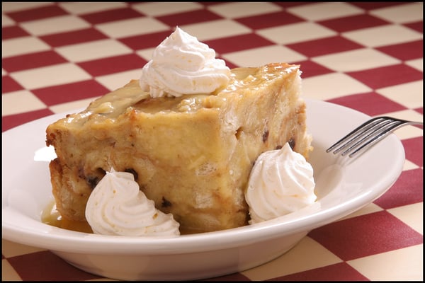 Photo of East Side Mario's - Livonia, MI, US. Bread Pudding with Jack Daniels Sauce