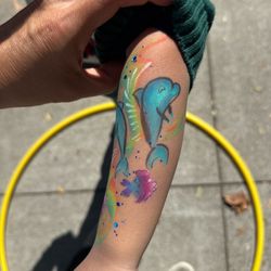 Infinite Creations Entertainment - Connie's art on my daughter's arm