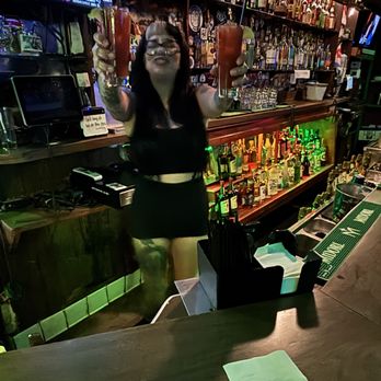 Callahans Irish Pub & Grill - Alex tending to the bar in the PM. Delivering our Tito's Clamato Bloody Mary's ($8.50/ea.) - Pubs Near Me - Azusa, California Callahans Irish Pub & Grill - Alex tending to the bar in the PM. Delivering our Tito's Clamato Bloody Mary's ($8.50/ea.) - Pubs Near Me - Azusa, California