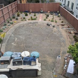 Our original concrete patio that was cracking and crumbling. And it is a oval-like shape which does not work for us. Our original concrete patio that was cracking and crumbling. And it is a oval-like shape which does not work for us.