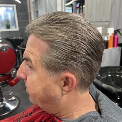 Legends Grooming Lounge - Got a one of our many valued guests here all cleaned up with a tight short taper on the sides and back of the neck area. FRESH