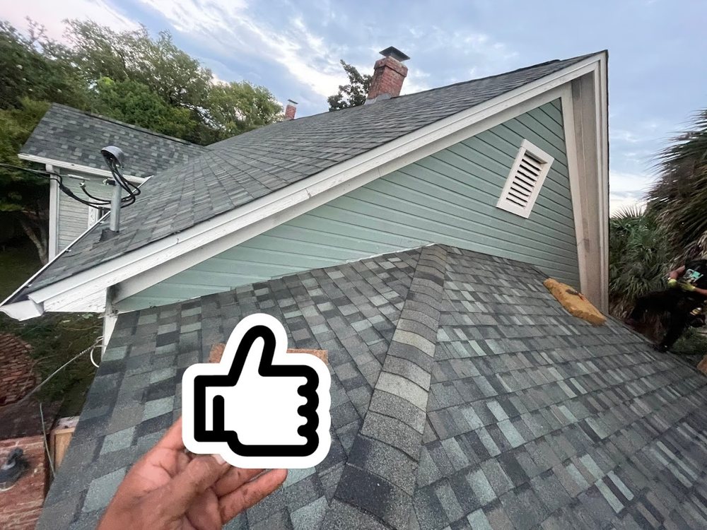 Slide of H.E. Roberts Roofing