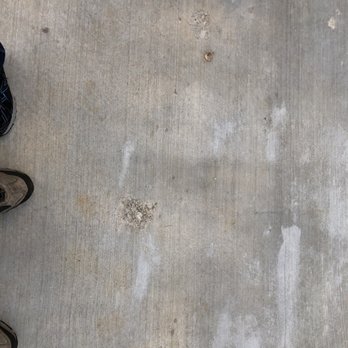 Jack Buss Concrete Construction - a person standing on a sidewalk - Masonry/Concrete Near Me