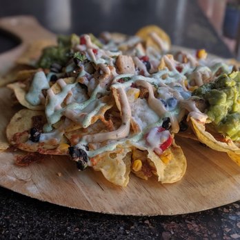 The Handlebar - Enjoy our signature "Doubletrack Nachos" layered with chicken or brisket. - Bars Near Me - Cañon City, Colorado