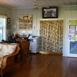 Interior of the Visitor and Business Services Center. The 1930 building is an excellent example of plantation, vernacular architecture.