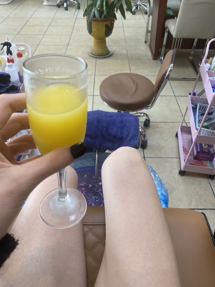 Brittany Nails and Spa Logo