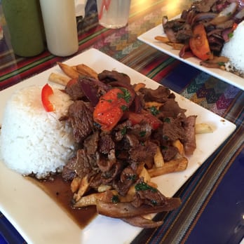 Listo el Pollo - #21. Loma Saltado. Beef stir fried with potatoes, onions and tomatoes in a soy/vinegar base. - Peruvian Near Me - Reseda, California Listo el Pollo - #21. Loma Saltado. Beef stir fried with potatoes, onions and tomatoes in a soy/vinegar base. - Peruvian Near Me - Reseda, California