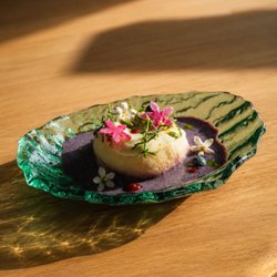Mosaru Vade :Fluffy, savory lentil donuts soaked in a cooling, lightly spiced yogurt bath and tropical sweet fresh fruit home sauce.