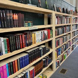 Quest Haven Books & Comics - Racks of books