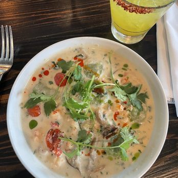 Maypop Restaurant - Crawfish Tom kha with scallion malfatti dumplings - New American Near Me - New Orleans, Louisiana Maypop Restaurant - Crawfish Tom kha with scallion malfatti dumplings - New American Near Me - New Orleans, Louisiana