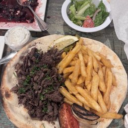Beef Shawarma plate with fries and a side salad Beef Shawarma plate with fries and a side salad