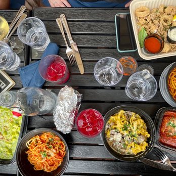 Caruso's Grocery - Roasted garlic caesar, pesto gnocchi, side spaghetti and bread, mushroom Alfredo, eggplant rollatini, spicy ragu, calamari - Italian Near Me - Washington, DC, District of Columbia
