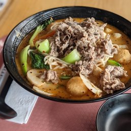 Mala-tang (their main item) with beef (by weight during happy hour), fresh noodles, fish cake, and veggies Mala-tang (their main item) with beef (by weight during happy hour), fresh noodles, fish cake, and veggies