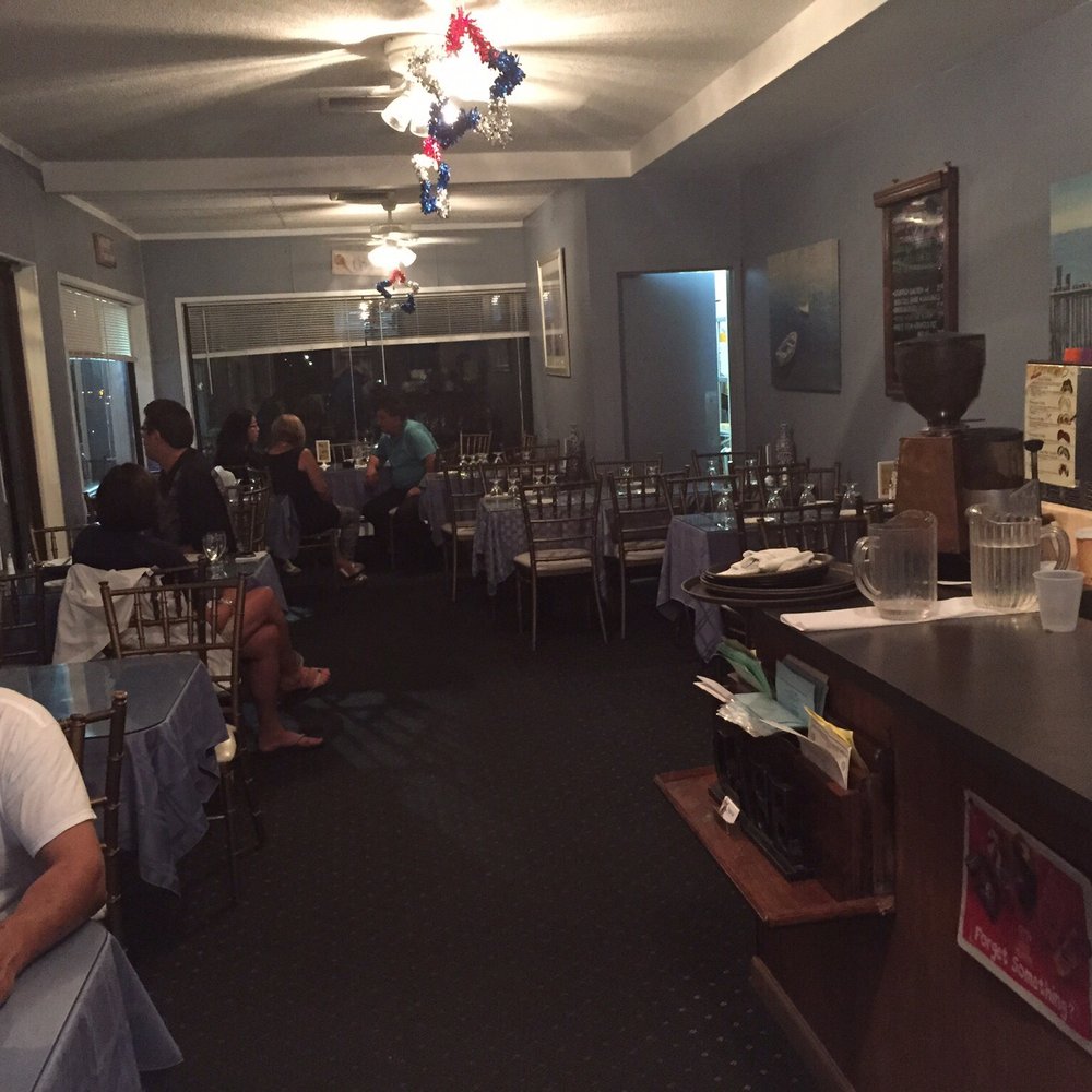 Lunello’s Restaurant - a man sitting at a table - Italian Near Me - New Rochelle, New York