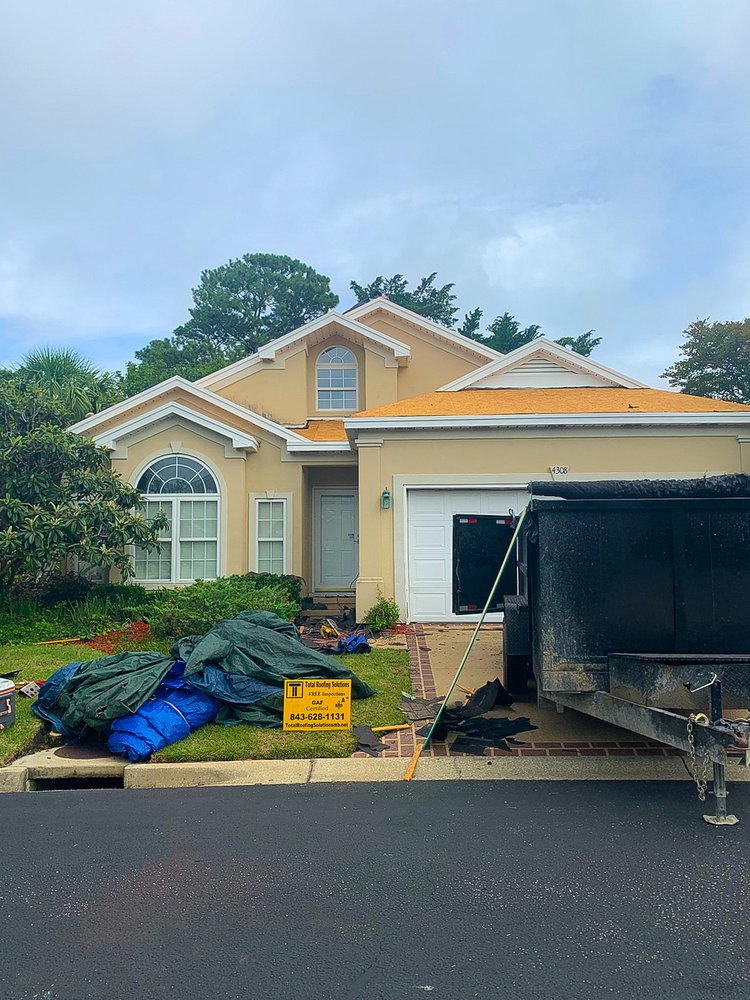 Slide of Total Roofing Solutions & Construction