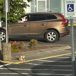 Grocery Outlet - Cart grabber throwing trash in parking lot !