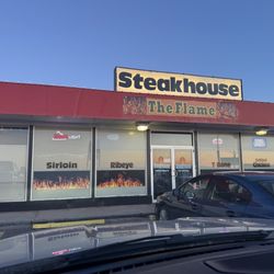 The Flame Steakhouse - Don't let the front scare you, it's got the best steaks around!!
