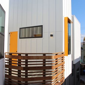 Design Draw Build - a white and orange house - Architects Near Me - Oakland, California