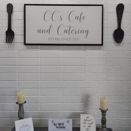 a table with candles and menus