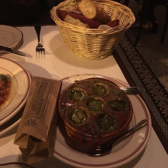 Le Diplomate - Super garlicky and delicious escargot with the bread basket in the back. - Brasseries Near Me - Washington, DC, District of Columbia Le Diplomate - Super garlicky and delicious escargot with the bread basket in the back. - Brasseries Near Me - Washington, DC, District of Columbia