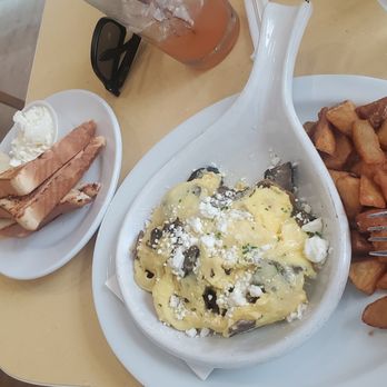 Wild Eggs - Wild mushroom and roasted garlic scramble with skillet potatoes and toast - Breakfast & Brunch Near Me - Louisville, Kentucky
