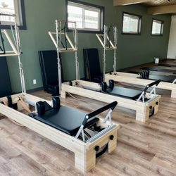 Milwaukie Pilates - Reformers/towers, mats and low chairs for group classes.