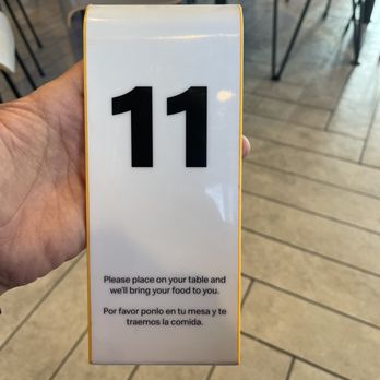 McDonald's - a hand holding a sign with the number 11 on it - Fast Food Near Me - Birmingham, Alabama McDonald's - a hand holding a sign with the number 11 on it - Fast Food Near Me - Birmingham, Alabama