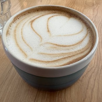 Le Elsdale - a cup of cappuccino on a wooden table - Cafes Near Me - Montreal, Quebec Le Elsdale - a cup of cappuccino on a wooden table - Cafes Near Me - Montreal, Quebec