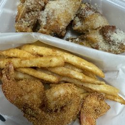 Garlic Parmesan chicken with a side of shrimp absolutely delicious! They took it out