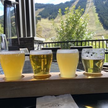 StillWest Brewery & Grill - Patio view with flight of beer - Brewpubs Near Me - Jackson, Wyoming StillWest Brewery & Grill - Patio view with flight of beer - Brewpubs Near Me - Jackson, Wyoming