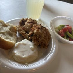 Grandma's Place - Fried chicken, mashed potatoes, fresh baked dinner roll, an cucumber tomato salad