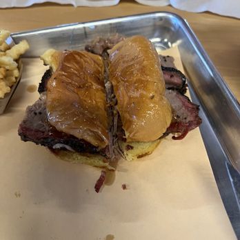 Guess Family Barbecue - Brisket sandwich - we cut to share. I don't recommend sharing, you will want the whole thing! - Barbeque Near Me - Waco, Texas Guess Family Barbecue - Brisket sandwich - we cut to share. I don't recommend sharing, you will want the whole thing! - Barbeque Near Me - Waco, Texas